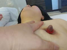 愛妻Yukieの乳首を吸引後、戻り防止の為紐を巻いて固定する。